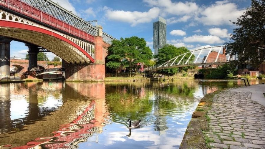 A Manchester river scene with picturesque bridges