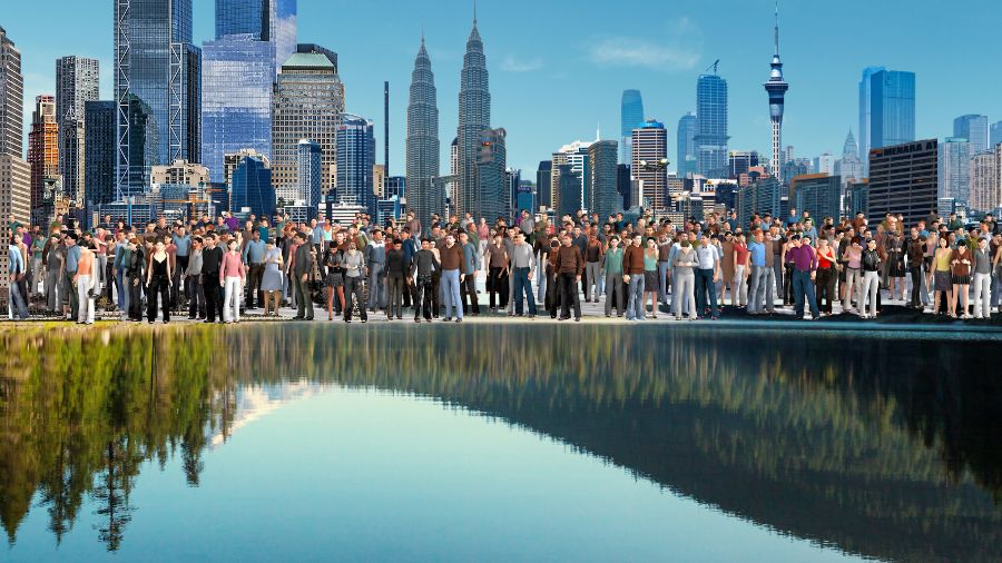 many people against a fictional skyline